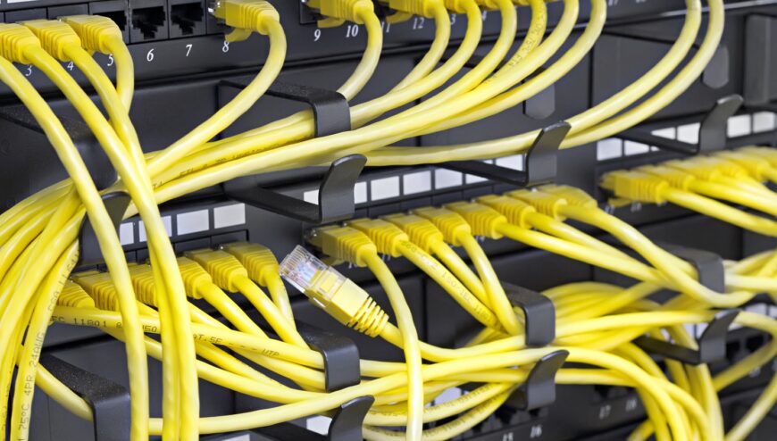organized data rack cabling with yellow cables